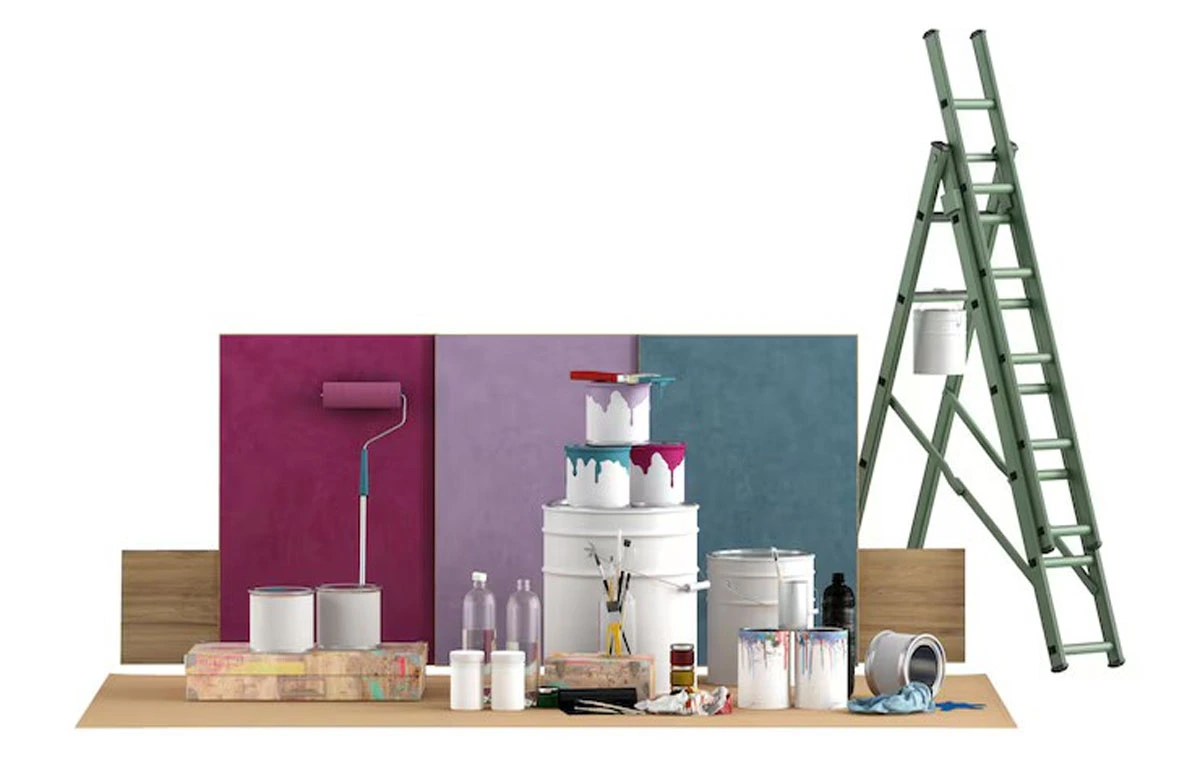 Various paint cans, brushes, and rollers set up for an indoor project, illustrating the best paint brands for UAE homes and offices with quality finishes.